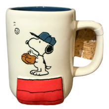 Load image into Gallery viewer, Mug with cartoon Snoopy character holding a baseball glove on a white background with a blue interior.
