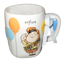 Load image into Gallery viewer, White mug with the boy character Russell from the Disney movie Up that shows balloons and the word 'explore' 
