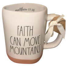 Load image into Gallery viewer, White mug with 'Faith Can Move Mountains' text and Matthew 17:20 on the inside with a tan bottom on a white background
