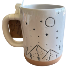 Load image into Gallery viewer, Ceramic mug with mountain and star design with a tan bottom on a white background
