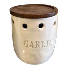 Load image into Gallery viewer, Jar with wood lid and holes that read 'Garlic' in grey text.
