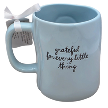 Load image into Gallery viewer, Light blue mug with 'grateful for every little thing' text on a white background
