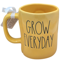 Load image into Gallery viewer, Yellow mug with 'Grow Everyday' text in black font.
