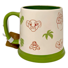 Load image into Gallery viewer, White mug with Lion King print that has a green bottom, handle and inside.
