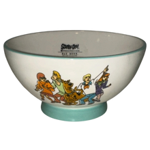 Load image into Gallery viewer, A white ceramic bowl featuring a colorful illustration of the Scooby-Doo gang and the Scooby-Doo logo printed inside the rim, set against a plain white background.

