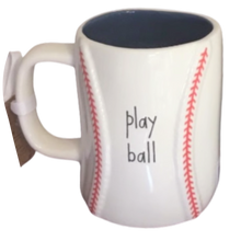Load image into Gallery viewer, Baseball-themed mug with 'play ball' text on a white background and blue interior that has baseball style red stitch design.
