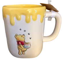 Load image into Gallery viewer, Mug with Winnie the Pooh design, featuring a honey container and bees, on a white background.
