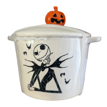 Load image into Gallery viewer, A white ceramic Halloween-themed lidded pot featuring a black illustrated Jack Skellington character on the front and an orange jack-o'-lantern knob on top, shown against a plain white background.
