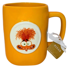 Load image into Gallery viewer, Orange mug that shows the character Anxiety from the Disney movie Inside Out.
