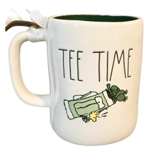 Load image into Gallery viewer, Mug with 'TEE TIME' text and golf graphic featuring woodstock on a white background with green interior.

