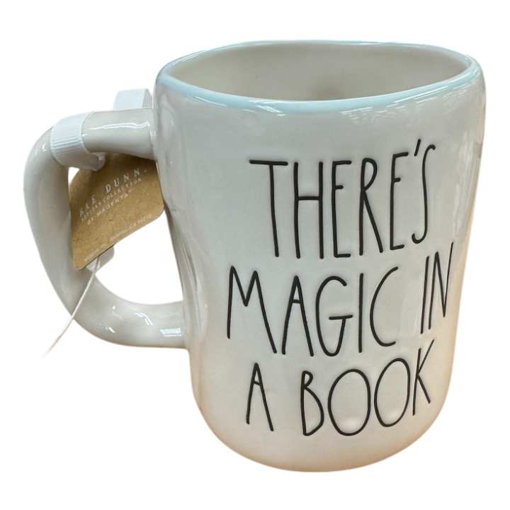 THERE IS MAGIC IN A BOOK Mug ⤿